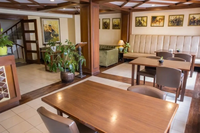 Sitting area by the window with a view of the Stupa, where you can also enjoy coffee and bakery treats