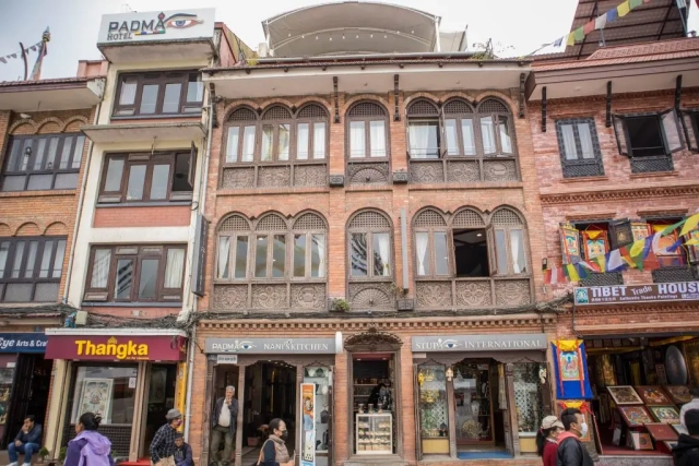 Exterior photo of Hotel Padma building showing traditional architecture and welcoming entrance