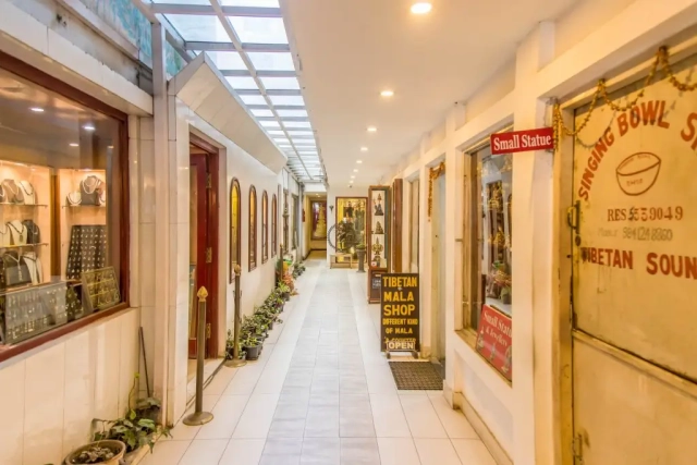Shops on the ground floor of the arcade, showcasing a variety of traditional options.